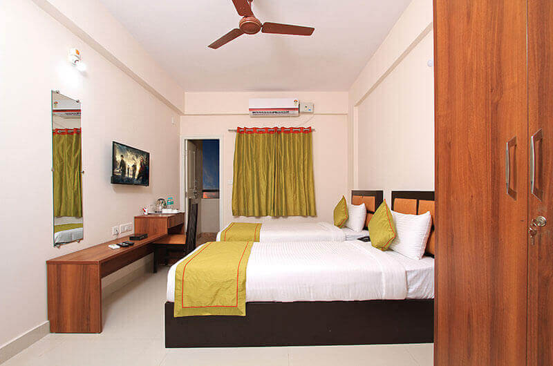 Book Deluxe Room at Grande Suites, Bangalore